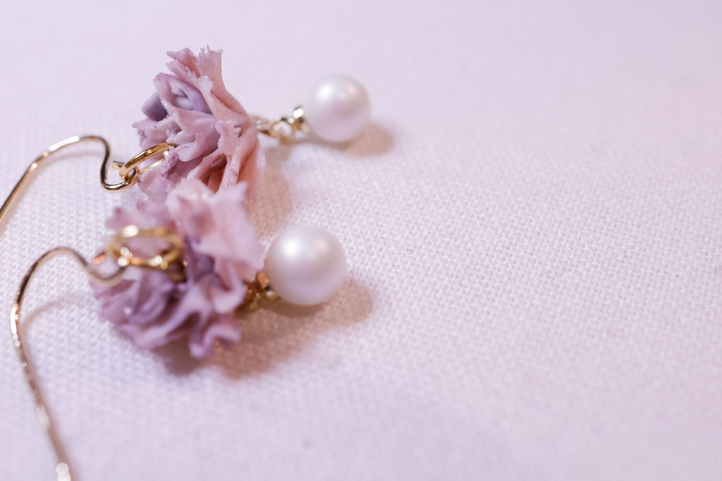 Purple carnation with pearl